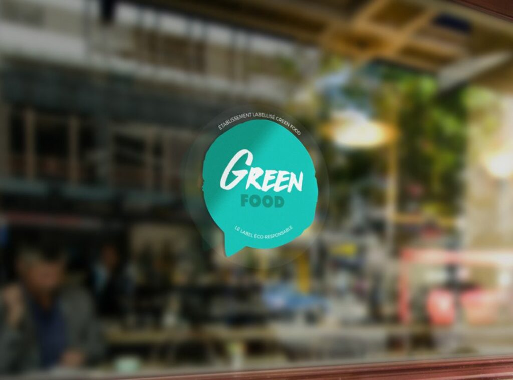 Macaron apposé sur les portes des restaurants labellisés GreenFood